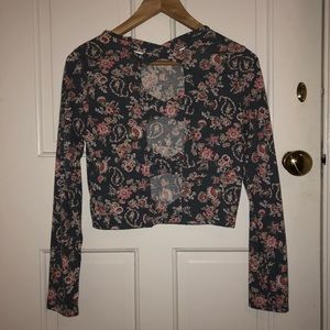 Long sleeved crop top with floral pattern